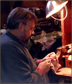 A photo of Scott making a pipe.